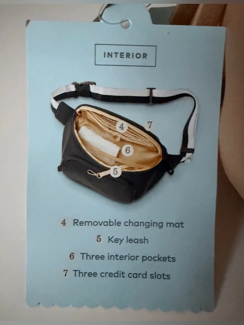 Cloud Island diaper sling in tan with checkered strap